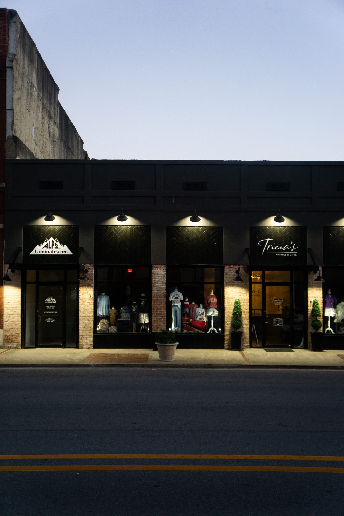 The rehabilitated ALPS and Tricia's storefronts at 109 Front Street SW at dusk