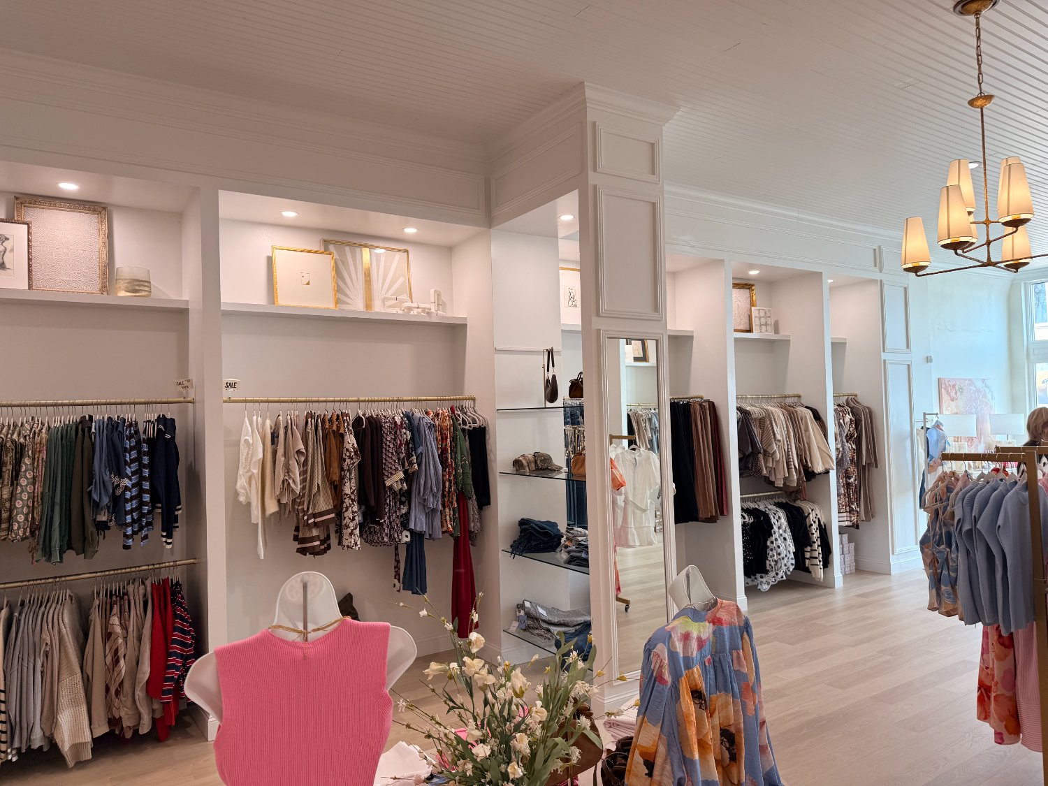 Recessed display bays and clothing racks in the boutique